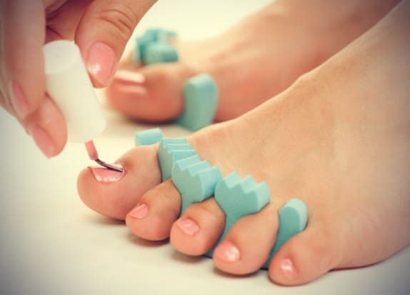 Painting Nails during Pedicure
